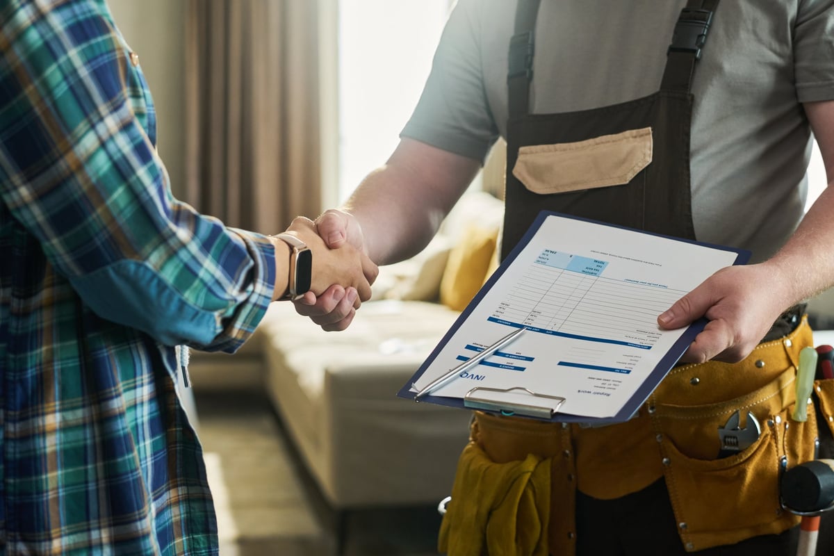 Plumbing company owner managing a growing business